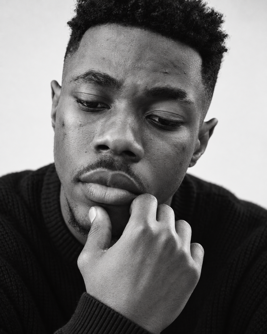 Ese Curtis in a close-up studio portrait